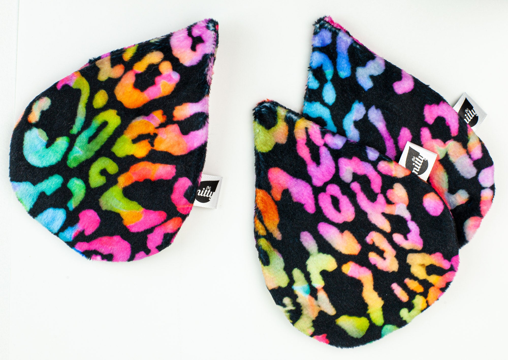 The 90s Mitty--a Makeup Mitty 3-Pack in a neon multicolor leopard print, ultra-gentle skin cleansing tool
